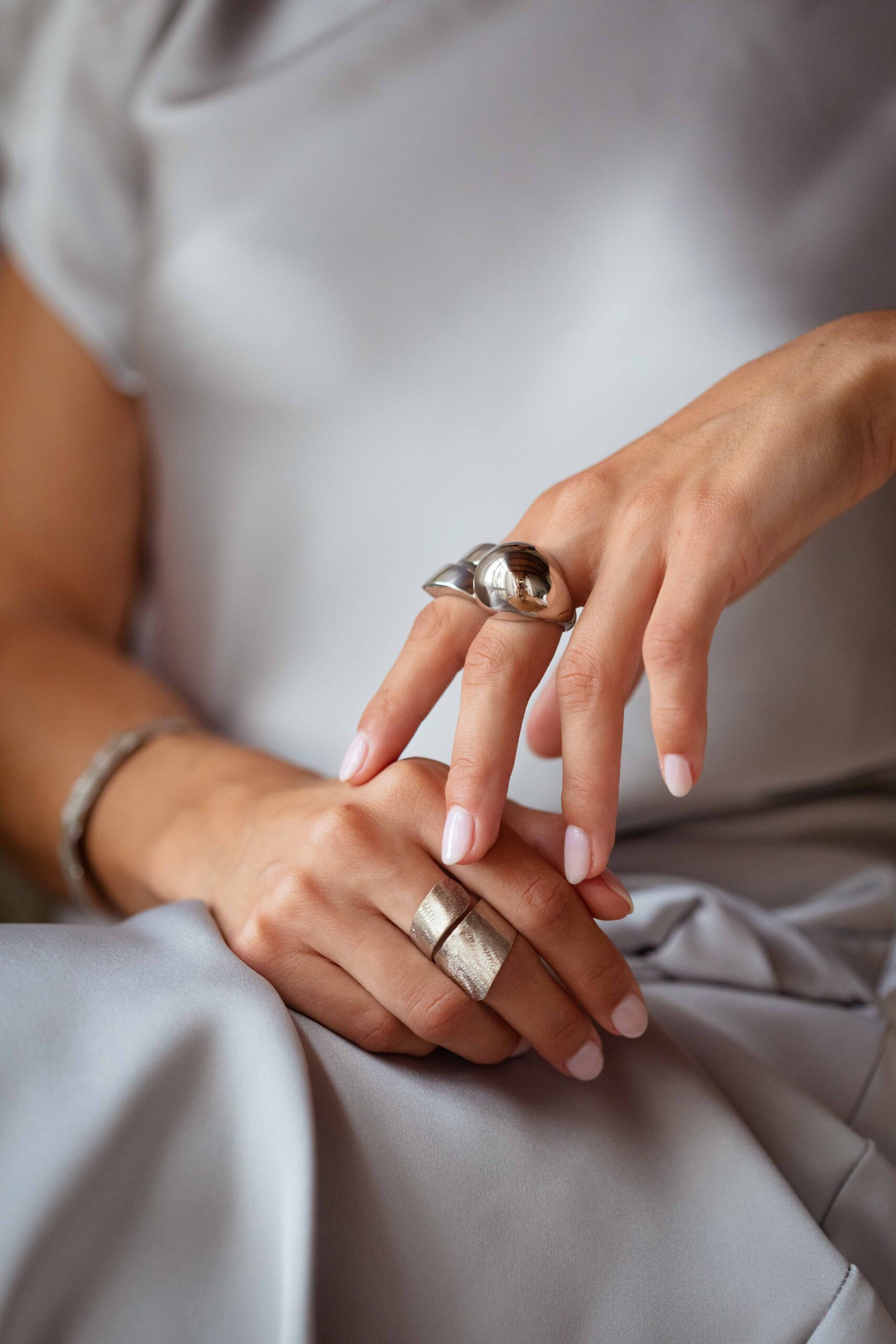 Universal size matte ball ring with rhodium finish